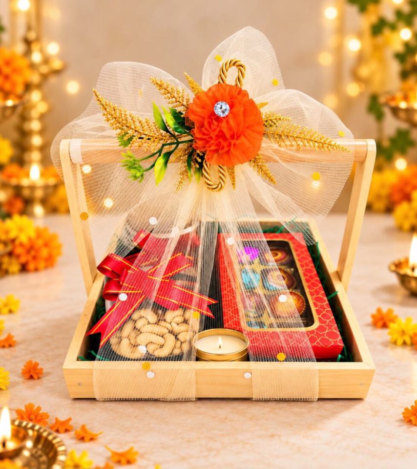 Festive Basket: a wooden basket with a jar of dry fruits, a box of chocolates and a candle, tied with a festive bow